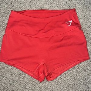 These “Ruby red” shorts have been lightly worn and washed.